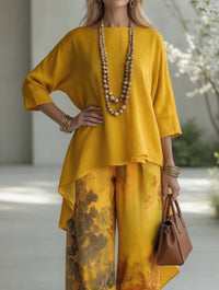 Alba conjunto boho de túnica asimétrica y pantalón ancho verde