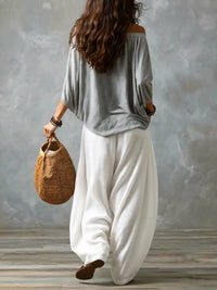Paloma conjunto boho de top de hombros descubiertos y pantalón gris
