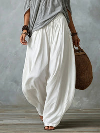 Paloma conjunto boho de top de hombros descubiertos y pantalón gris