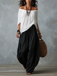 Paloma conjunto boho de top de hombros descubiertos y pantalón blanco