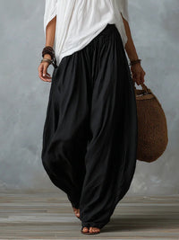 Paloma conjunto boho de top de hombros descubiertos y pantalón gris